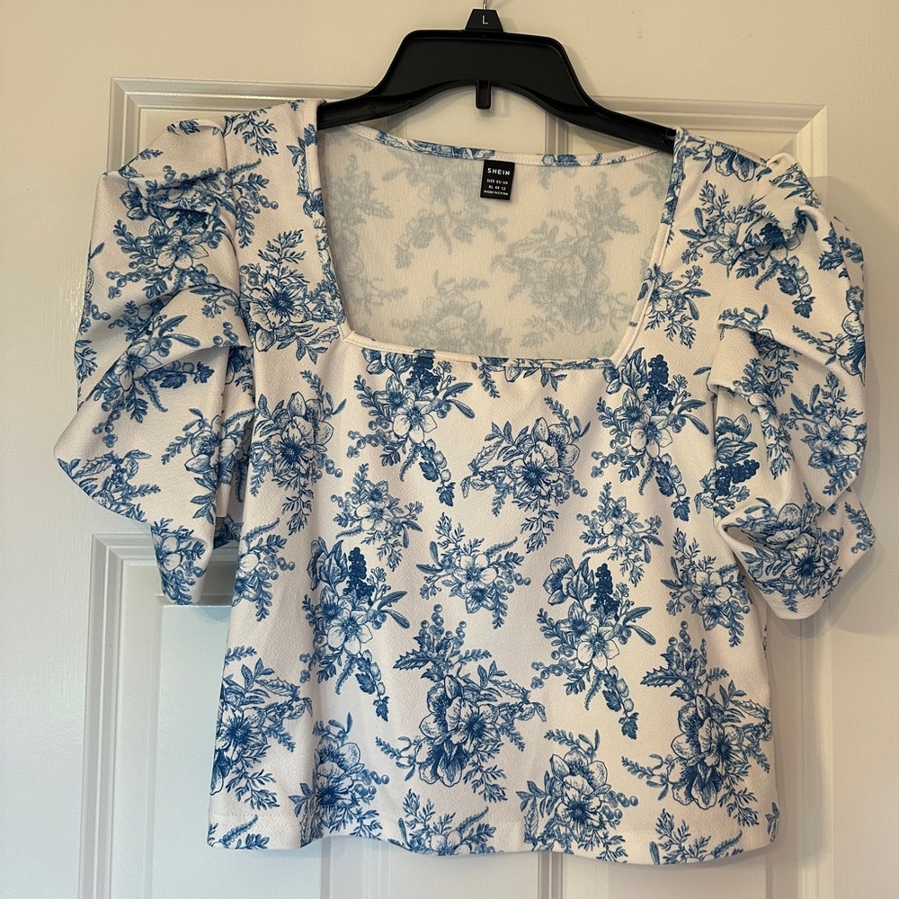 Blue and white floral blouse